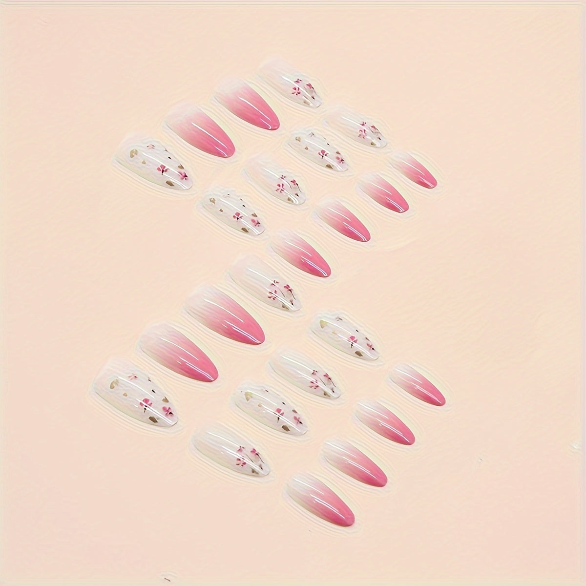 Gradient Pink Almond-Shaped Nails Floral Design